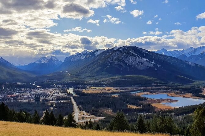 8 Iconic Stops. 12 Comfy Seats. See Banff's Best in First Class. - Mount Norquay Lookout and Banff from above
