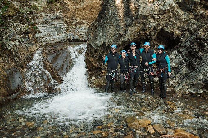 Adrenaline Canyoning Tour - Rappels, slides, ladders, and mandatory commitment