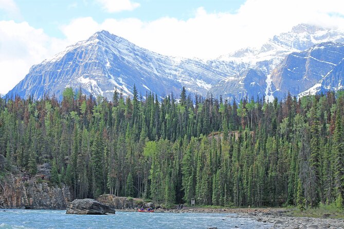 Athabasca Canyon Run Family Rafting: Class II Plus Rapids - The calm finish lets you enjoy the Athabasca River