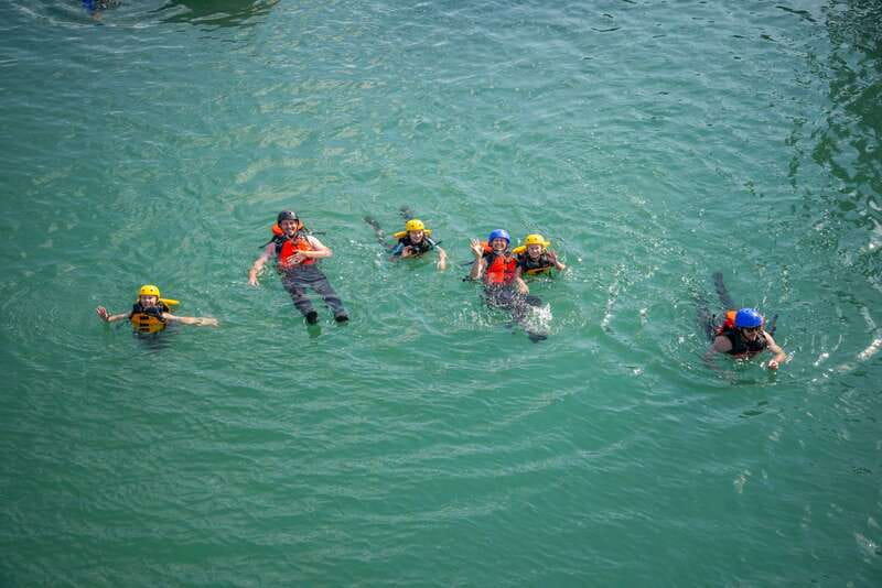Banff: Kananaskis River Whitewater Rafting Tour - Safety instruction before the five-minute river transfer