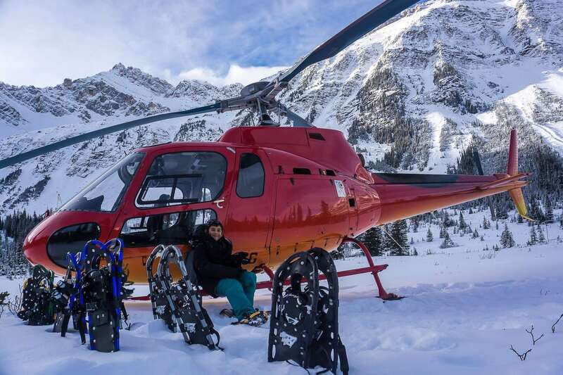 Canadian Rockies: Abraham Lake Ice Bubbles Helicopter Tour - Warming up by the fire at base