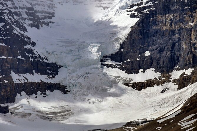 Columbia Icefield Glacier Adventure Day Tour from Calgary/ Banff - Peyto Lake and its changing blue color