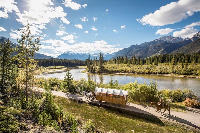 Covered Wagon Ride in Banff with Western Cookout - Rolling beside the Bow River