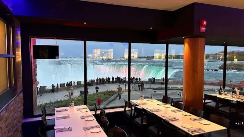 From Toronto: Niagara Falls Tour with Journey & Dinner - Clifton Hill brings lights, shops, and one hour on your own