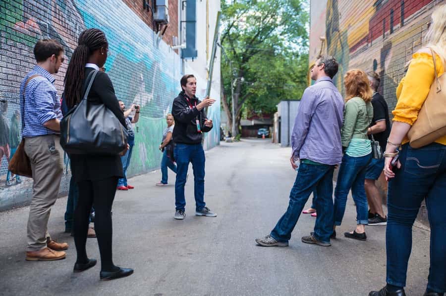 Hidden Toronto: Kensington Market & Chinatown Walk - Crossing into Chinatown with useful local context