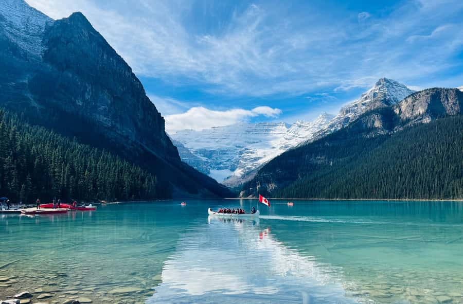 Louise, Moraine/Johnston Canyon, Minnewanka & Banff Town - Lake Louise starts the day with a famous view