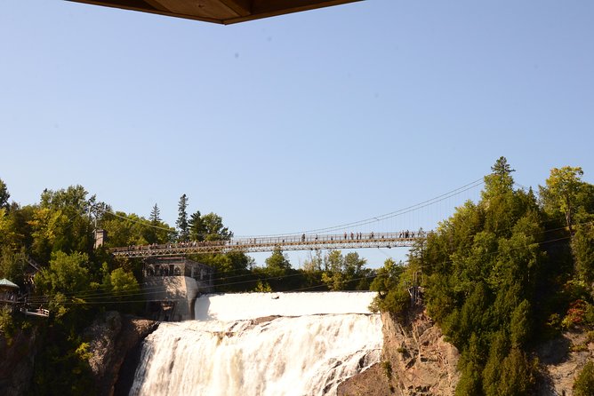 Magnificent Montmorency Falls E-Bike Tour - Reaching Montmorency Falls from below