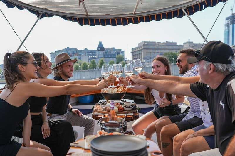 Montreal: Electric Boat Cruise with Onboard Drinks - Boarding at Jacques-Cartier Pier