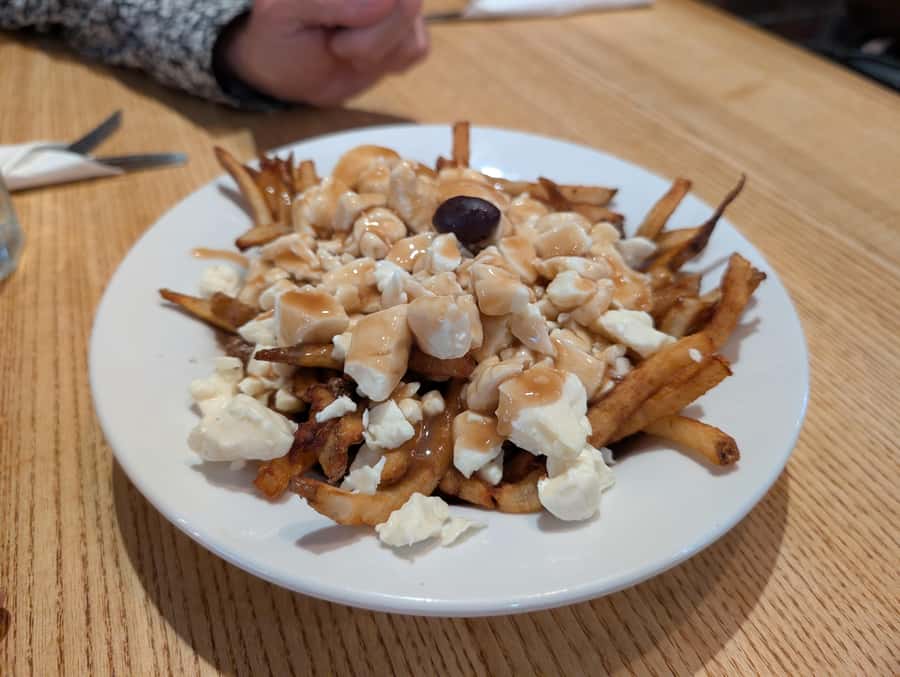 Montreal: Mile End District Food Tour with 8+ Tastings - Street gnocchi in a takeout box