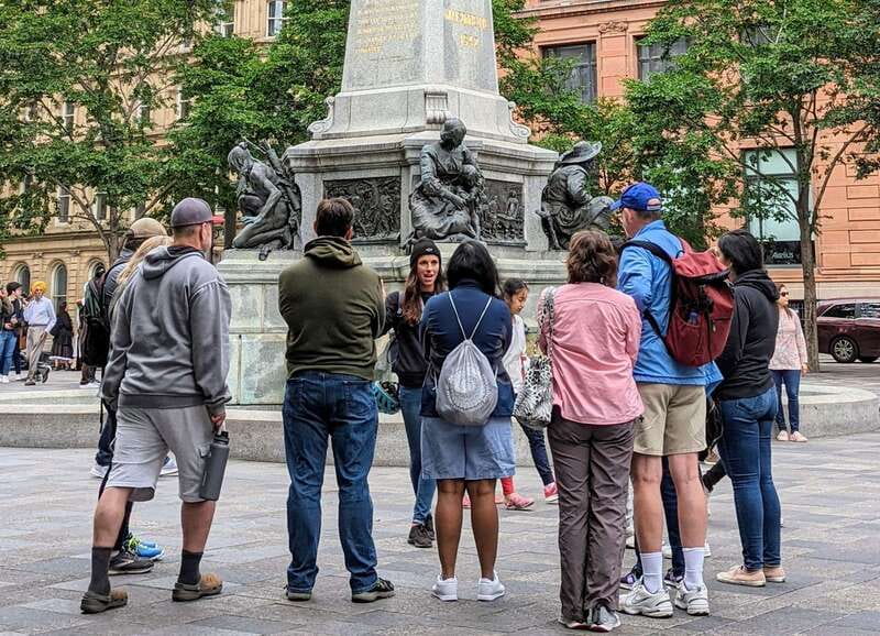 Montreal: Top Rated Small Group Old Montreal Walking Tour - Place dArmes and the outside of Notre-Dame