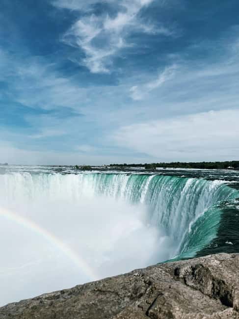 Niagara Falls: Day Tour with Boat & Journey Behind the Falls - Pickup in Niagara Falls and the first sightseeing loop
