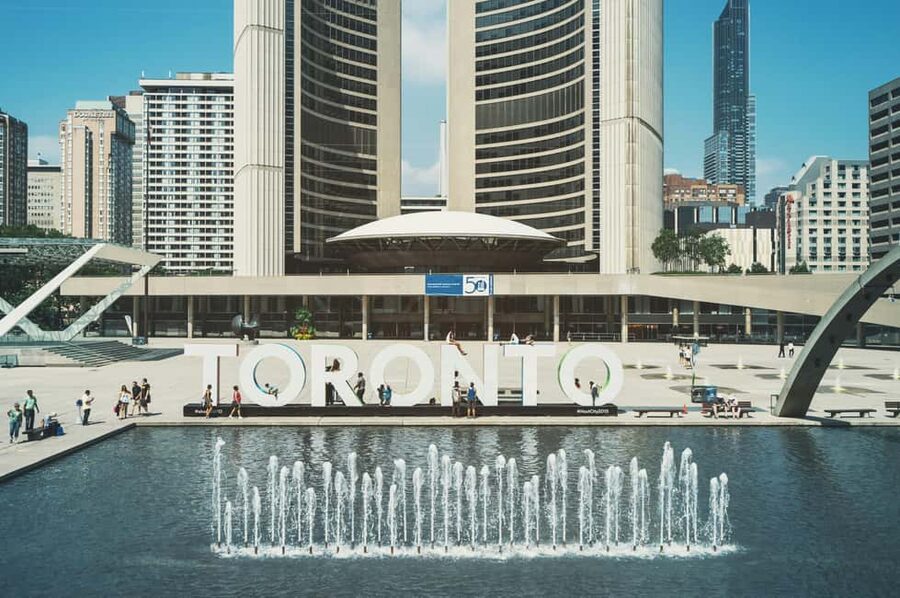Toronto Highlights Walking Tour with Tower Entry - Riding the glass elevator to the CN Tower