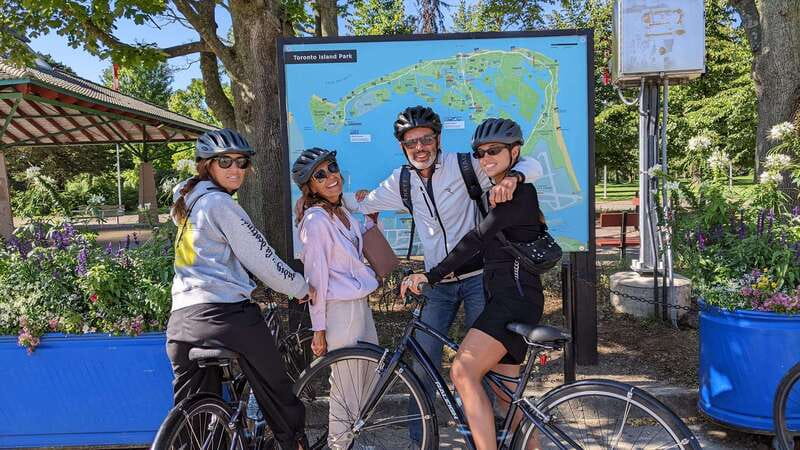 Toronto Islands: Morning or Twilight 3.5-Hour Bike Tour - Riding from downtown to the ferry