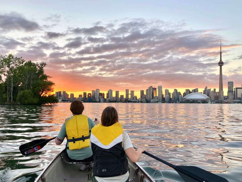 Toronto Islands: Sunset Canoe Tour - Passing beneath the 1905 bridge