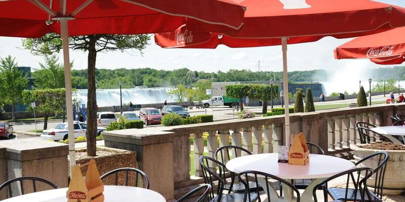 Toronto: Niagara Falls Tour with Boat and Lunch - Getting close on the Hornblower cruise