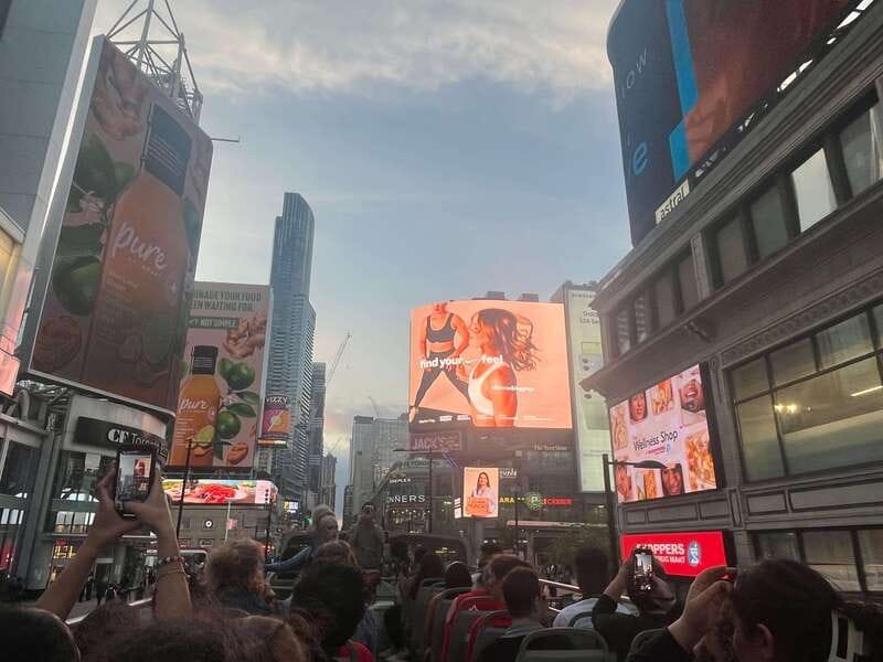 Toronto: Night Sightseeing Tour on a Double-Decker Bus - Yonge-Dundas Square and the first city views