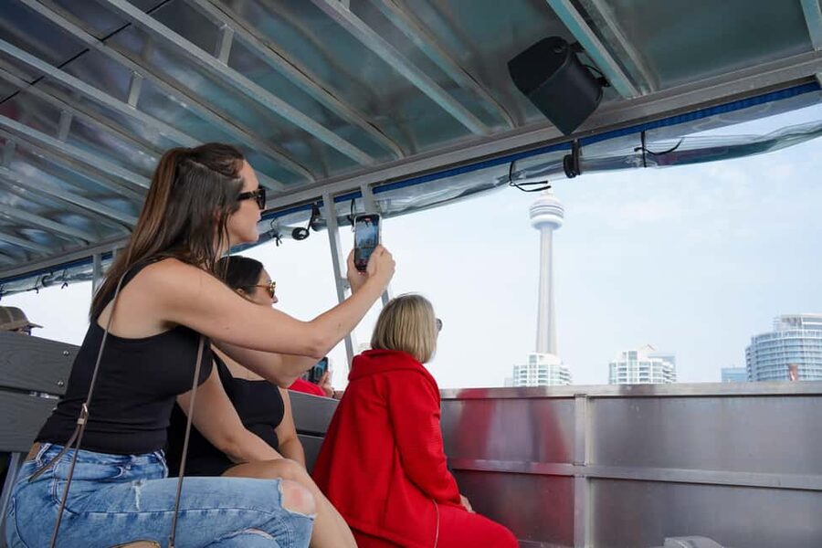 Toronto: Premium Driving Tour with Tower and Harbour Cruise - The CN Tower puts Toronto in perspective