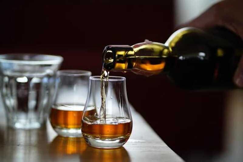Toronto: Prohibition & Spirits History Walking Tour - Finishing at a local bar with three samples