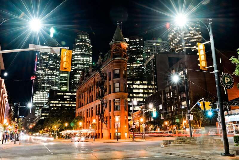 Toronto: Small Group Night Tour with Harbour Boat Cruise - Toronto by water, road, and evening light