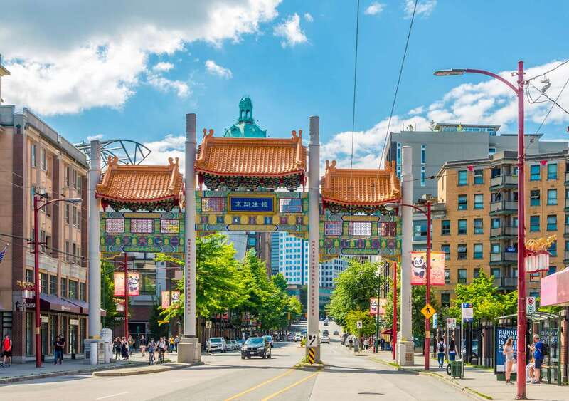 Vancouver: City Highlights Tour with Hotel Transfers - English Bay and the waterfront pass by the window