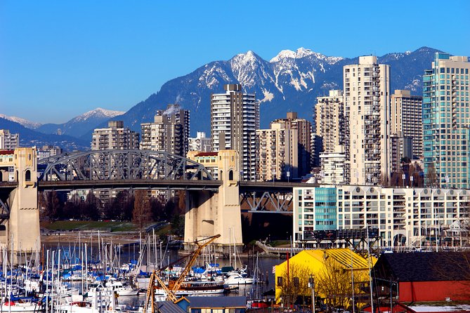 Vancouver Tour: Stanley Park, Granville Island & Capilano Bridge - Canada Place and Robson Street set the scene